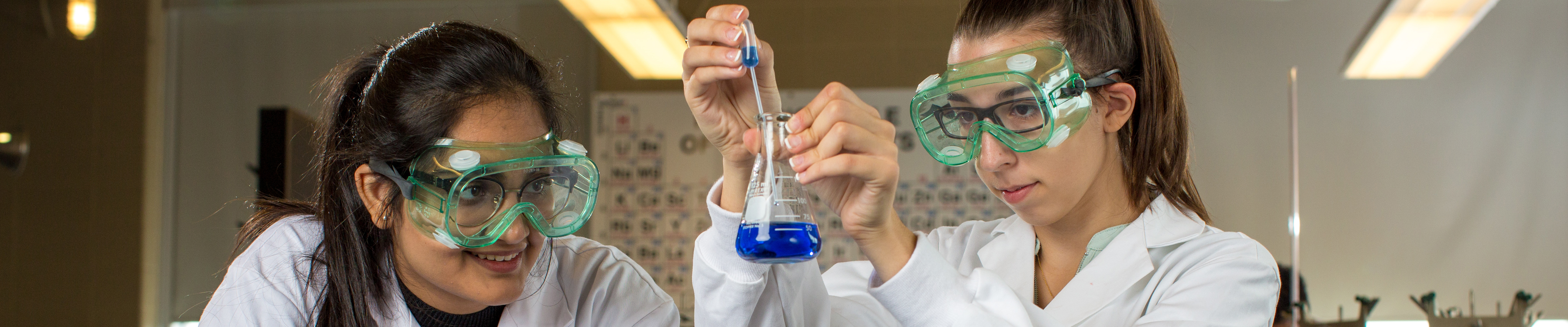 Students in a lab working with chemicals